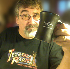 Andy Taylor hold a Kim Komando Coffee Mug